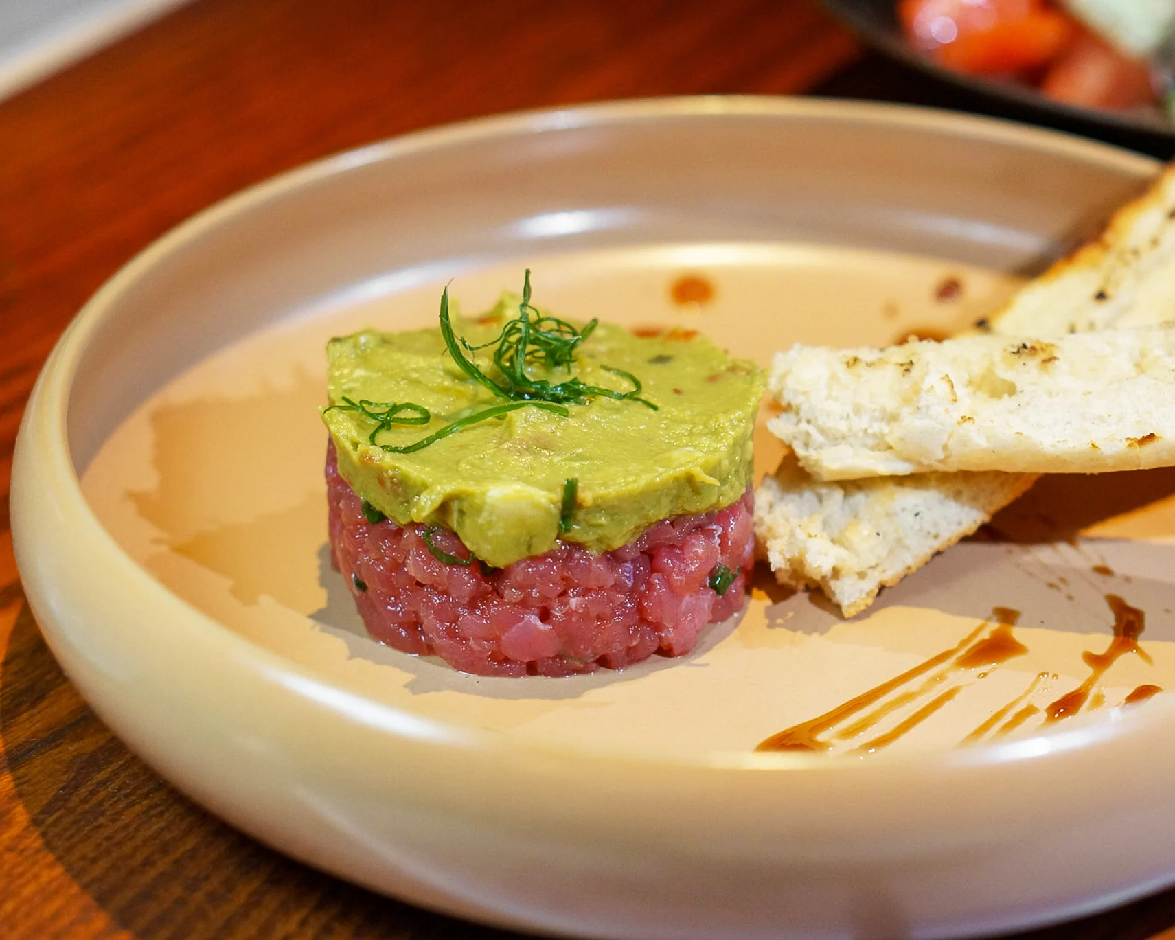 Porterhouse Music Bar & Restaurant signature dishes PORTERHOUSE CHICKEN WINGS, PRIME BEEF TARTARE, Pepperoni Pizza.